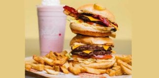 burgers, fries and strawberry shake from Triple O's