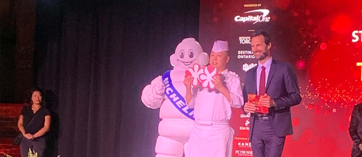 Michelin Man with a chef Masaki Saito