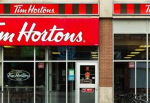 Outside of a Tim Hortons Coffee Shop during the day