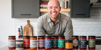 Chef Stefano Faita with a variety of his premium pasta sauces