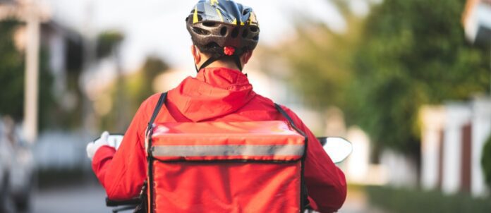 Man on a bike delivering food orders