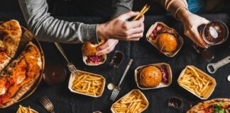 A group of friends eating fast food together