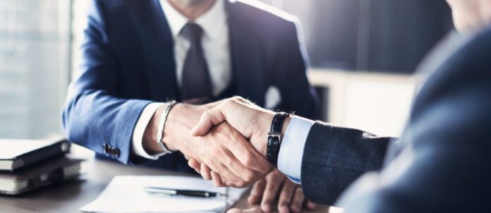 Business partnership meeting in office