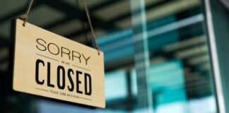Closed sign on Restaurant/Storefront