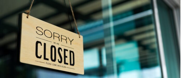 Closed sign on Restaurant/Storefront