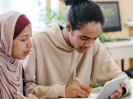 Two Students working on homework together