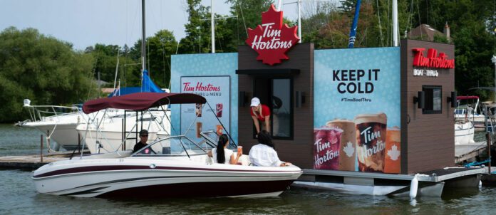 Boat Driving Through The First-Ever Boat-Thru on Ontario’s Lake Scugog