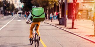 Food Delivery Courier on His Bicycle