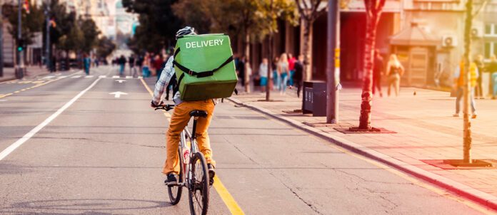 Food Delivery Courier on His Bicycle