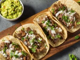 Homemade Pork Carnitas Tacos with Cilantro and Onion