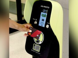 Tim Hortons credit card being scanned a PRESTO Card Machine