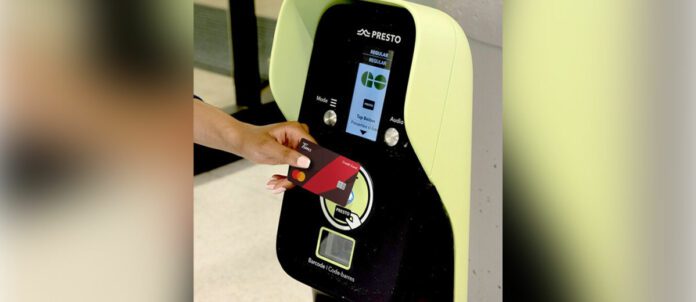 Tim Hortons credit card being scanned a PRESTO Card Machine