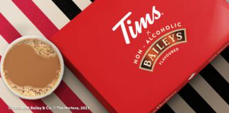 Tim Hortons and BAILEYS® non-alcoholic menu collaboration Cup of Coffee beside Donut Box