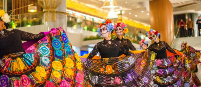 Dancers at Fairmont Pacific Rim Celebrating Día de Muertos