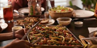 Family at dinner eating McCain Medley's vegetables