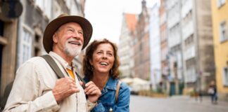 Happy Tourist Couple on Vacation Sight Seeing