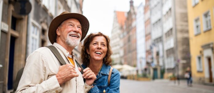 Happy Tourist Couple on Vacation Sight Seeing