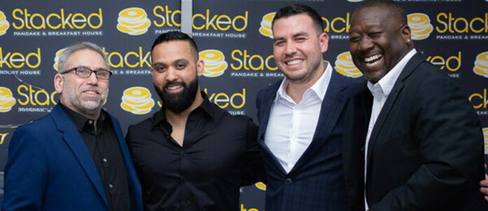 Stacked Pancake Executive standing together