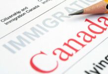 Canadian Immigration form with pencil on top of document
