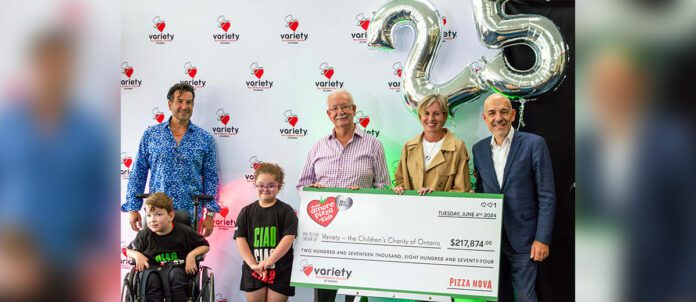 Pizza Nova's president Domenic Primucci donating cheque to The Children’s Charity of Ontario