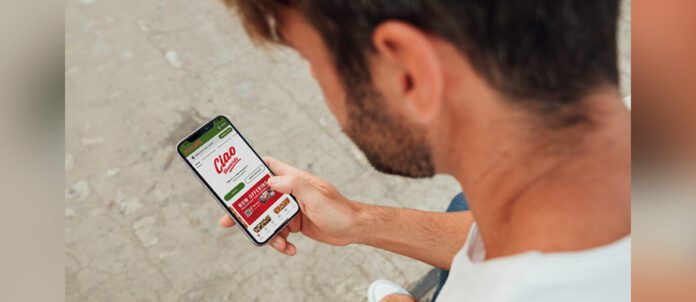 Customer using Pizza Nova Loyalty Program App: Ciao Rewards