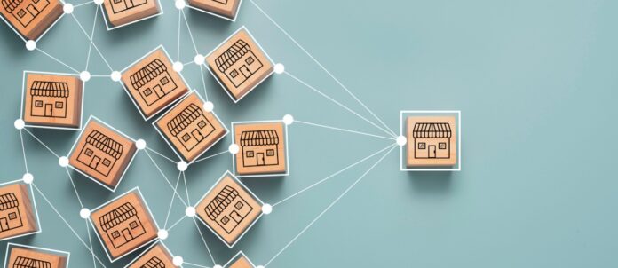 Wooden cube blocks with store icon on front and connection link with others cube blocks