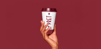 Woman holding Pret A Manger Coffee cup