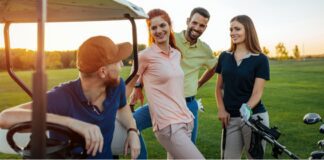 Group of friends golfing together on a sunny day
