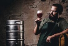 Sommelier enjoy pint of aged wine