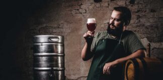 Sommelier enjoy pint of aged wine