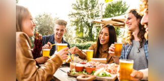 Group of friends enjoying a pint of beer together