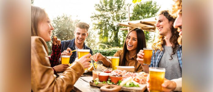 Group of friends enjoying a pint of beer together