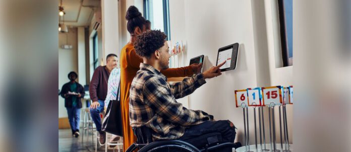 Person using Square Kiosk tablet