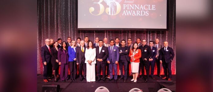 Attendees from 35th-Annual Pinnacle Awards on stage together