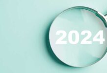 Magnifying glass with year of 2024 text inside glass