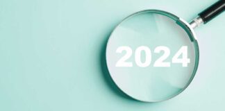 Magnifying glass with year of 2024 text inside glass