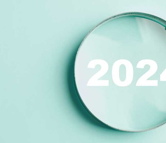 Magnifying glass with year of 2024 text inside glass