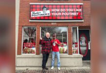 Photo of president & COO, Mark Cunningham and franchisee Gurinder Garcha