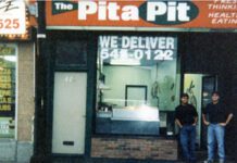 Pita Pit founders John and Nelson in front of the first ever Pita Pit location in Kingston, Ontario, in 1995