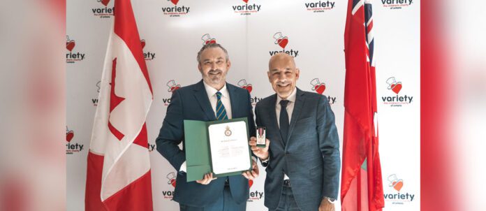 Domenic Primucci receives the King Charles III Coronation Medal