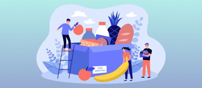 Group of volunteers gathering grocery box to help communities