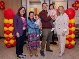 Photo at Ronald McDonald House Charities South Central Ontario with the Presidents and CEO's of McDonald's Canada and RMHC Canada along with a family receiving support