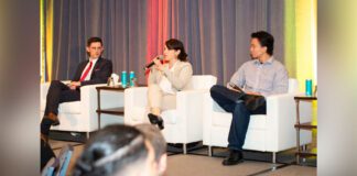 Guest speakers talking on stage at Top-30-Under-30 2025 Summit