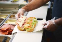 Preparing sandwich in the fast food restaurant